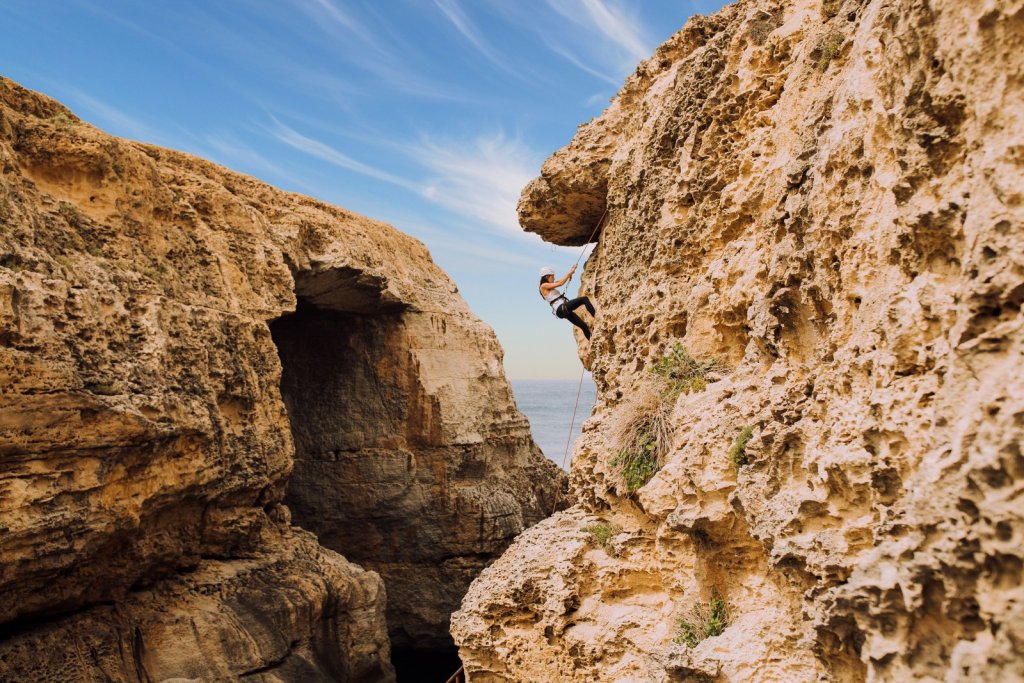 article-3_2_young-woman-climbing-cliffs-of-gozo